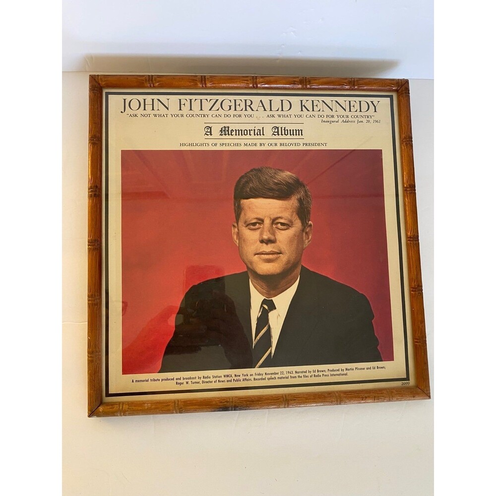 John Fitzgerald Kennedy: A Memorial Album made in a frame.